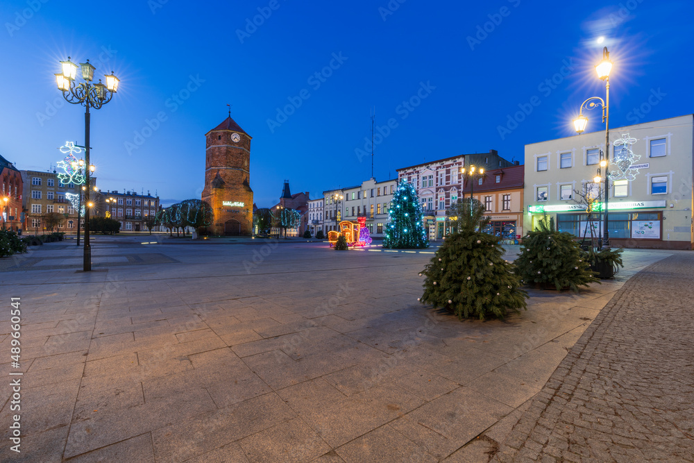 Obraz premium Znin, Poland December 20, 2021; The urban landscape of the town of Żnin in the evening, Kuyavian-Pomeranian Voivodeship, Poland.
