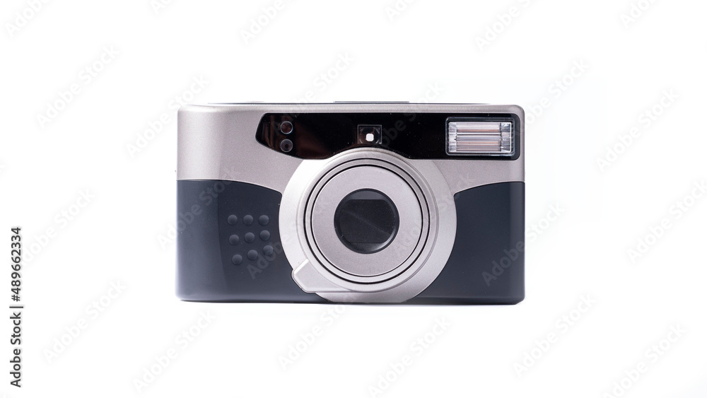 Point and shoot camera on white background. film photography