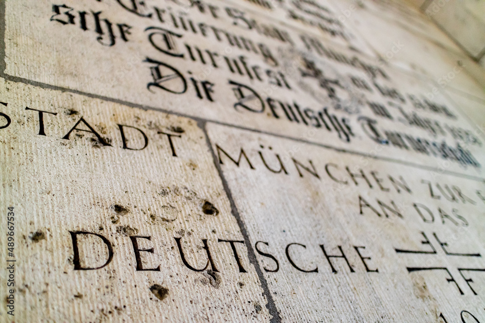 Old stone German sign about Munich