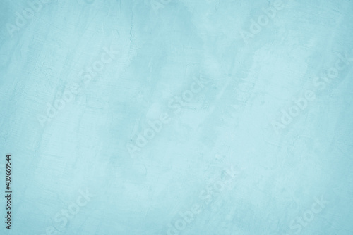 Blue concrete stone texture for background in summer wallpaper. Concrete abstract wall of light cyan color, cement texture mint green for design.