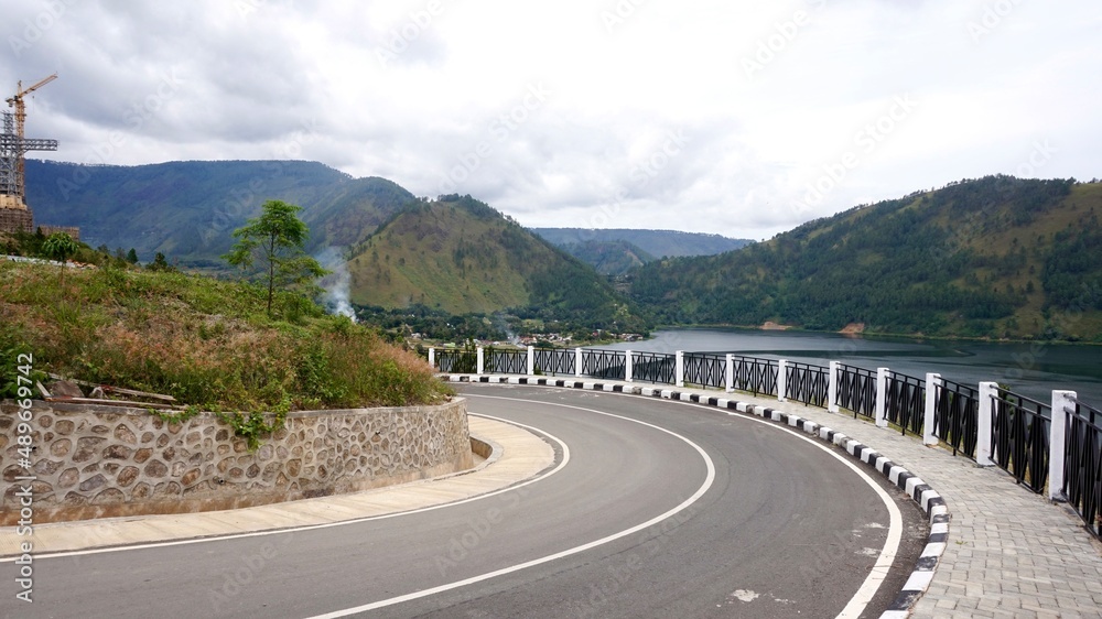 The road in Bukit Sibea-bea is also very beautiful. The winding road is often called the Love Curve or the 8 Curve The road in Bukit Sibea-bea is also very beautiful. The winding road is often called the Love Curve or the 8 Curve