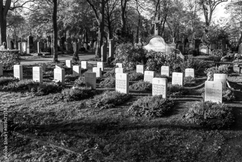 Greyscale image of a neat rural graveyard