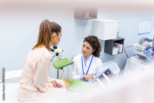 gynecologist doctor and a patient on a gynecological chair. Preventive reception, preparation for medical examination, pregnancy management, health care gynecology contol photo