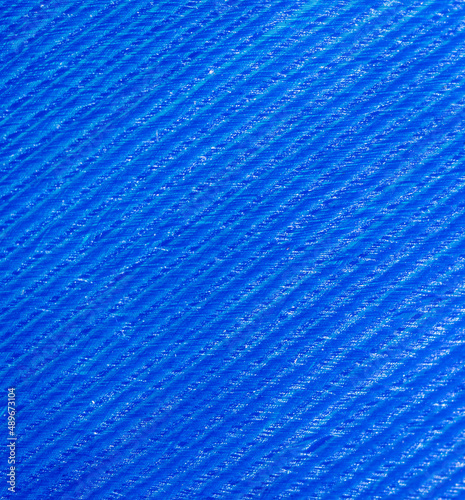 Blue feather as a background.