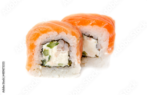 Sushi with salmon and cucumber on a white background.