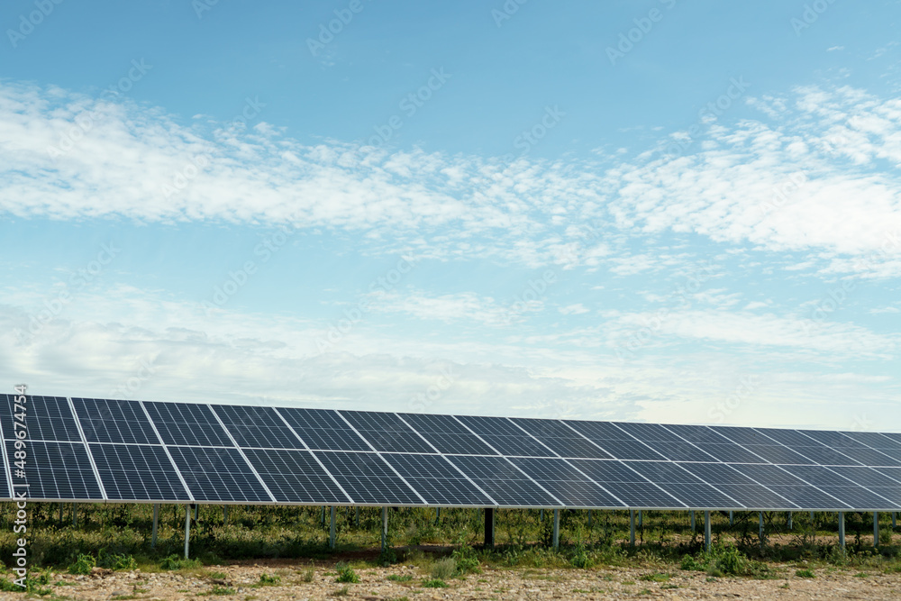 Field of solar panels to generate green and sustainable energy for the industries in the area. Field of solar panels to generate green and sustainable energy for the industries in the area.