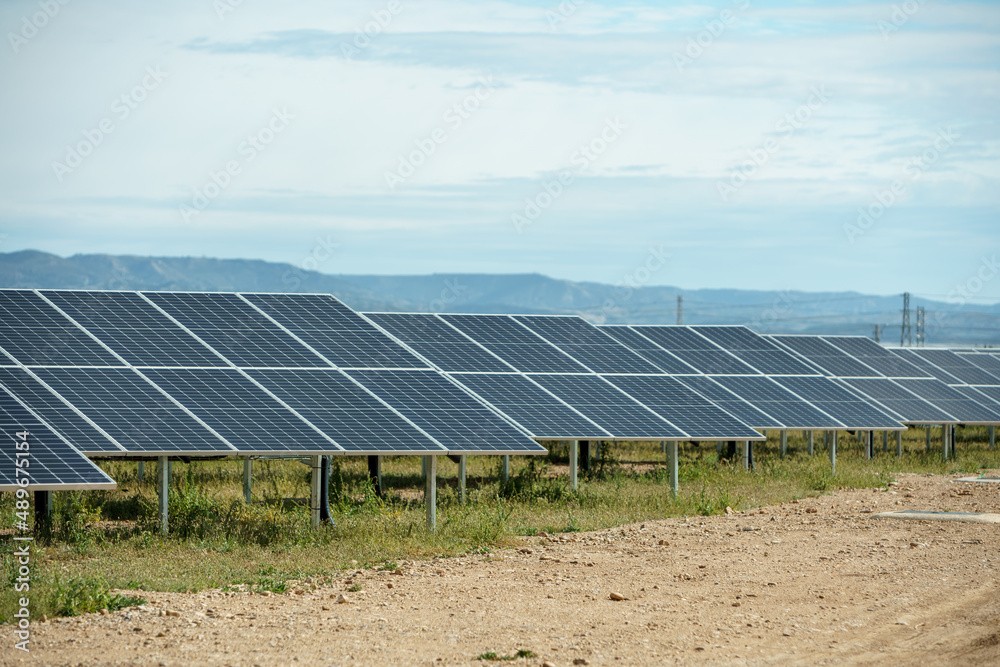 Field of solar panels to generate green and sustainable energy for the industries in the area. Field of solar panels to generate green and sustainable energy for the industries in the area.