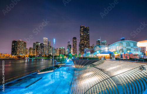 chicago,illinois,usa. 08-15-17: beautiful Navy pier at night with chicago skyline.