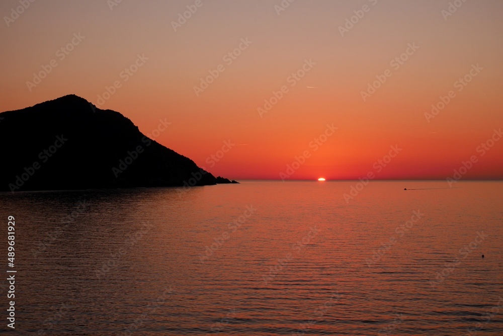 Beautiful sunset at beach of Galeria. Corsica, France.