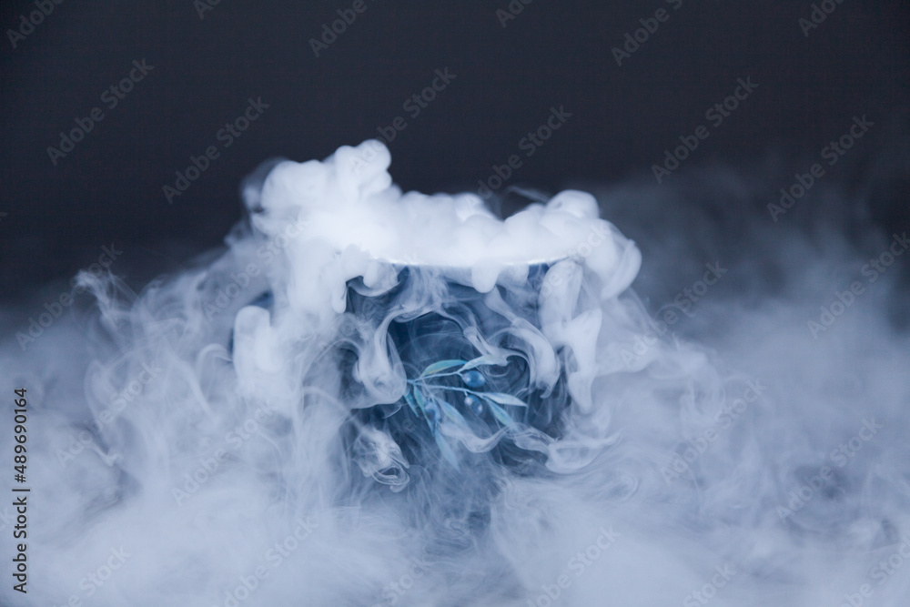 Dry ice vapour made of carbon dioxide spilling out into air Stock Photo