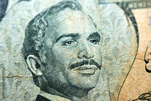 A portrait of King Hussein II the second from the obverse side of 1 one Jordanian dinar banknote currency from date 1975 to 1992 issued by central bank of Jordan, Old vintage Jordanian money