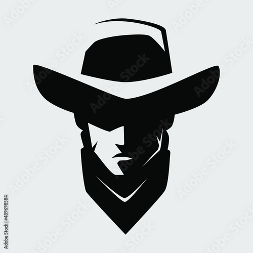 Cowboy outlaw portrait symbol on gray backdrop. Design element photo