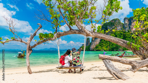 Couple traveler relaxing on swing joy nature view scenic landscape Phakbia beach Krabi, Attraction famous place tourist travel Phuket Thailand summer holiday vacation trip, Beautiful destination Asia