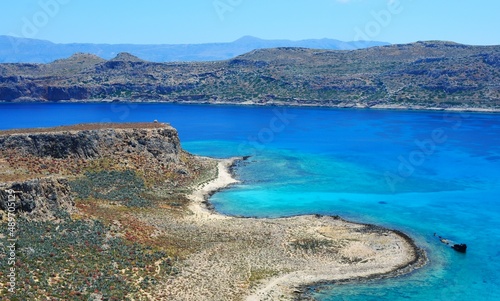 The clear turquoise waters of Gramvousa Bay near Balos lagoon, Crete, Greece. Coastline of the Mediterranean sea.