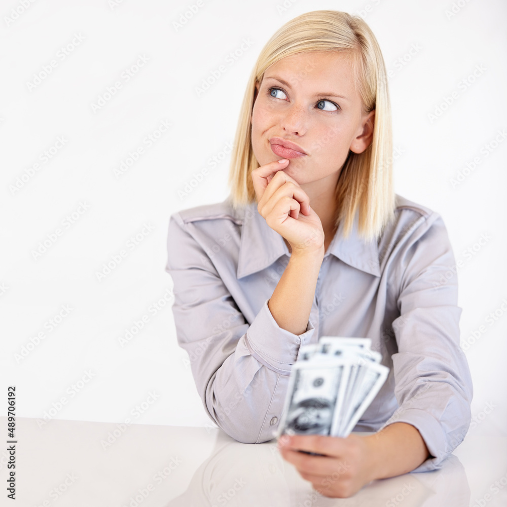 Deciding What To Do With Her Money A Pretty Young Woman Wondering What