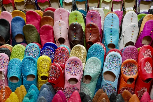 Close up of traditional vibrant slippers, babouches, in the souk. Marrakech, Morocco.