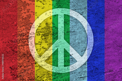 Peace background. White symbol of peace on rainbow colors scratched grunge background.