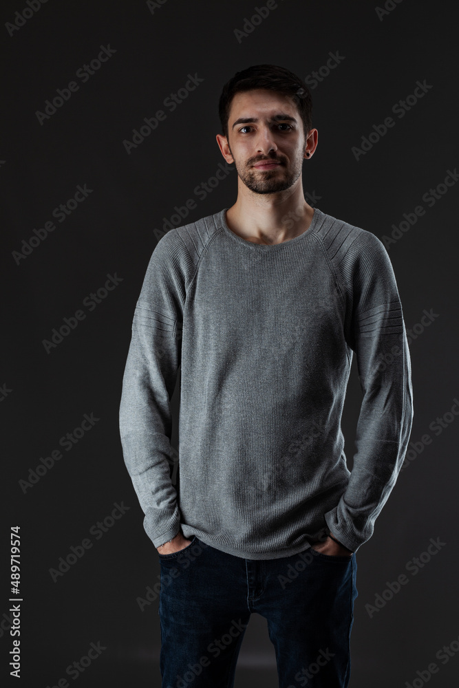 Portrait of young handsome male with beard wearing blouse Portrait of young handsome male with beard wearing blouse