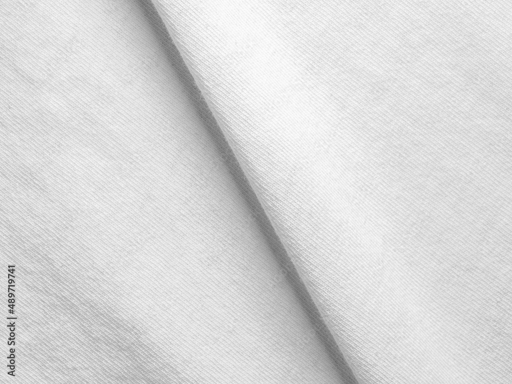 White fabric texture with a diagonal crease - exposed fibers - close up full frame view - high resolution photo White fabric texture with a diagonal crease - exposed fibers - close up full frame view - high resolution photo
