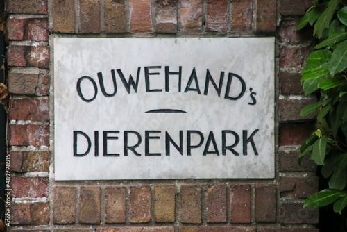 Old sign at gate of Ouwehands Dierenpark Zoo in Rhenen photo