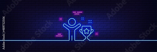 Neon light glow effect. Winner cup line icon. Award trophy sign. Best achievement symbol. 3d line neon glow icon. Brick wall banner. Winner cup outline. Vector