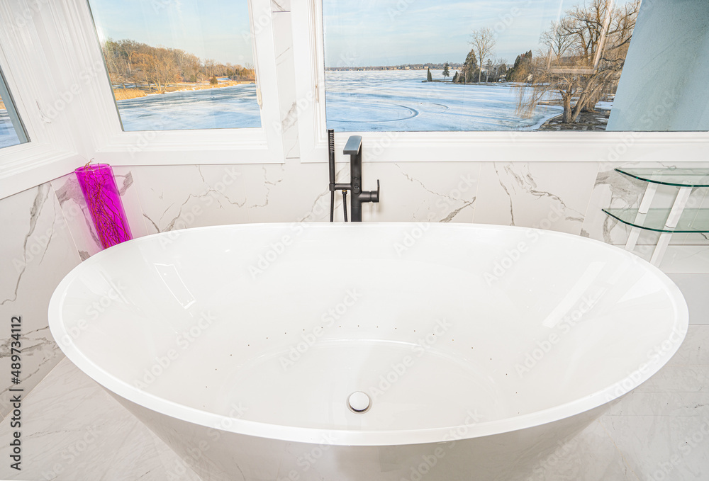 Fototapeta premium soaking tub has been installed with a scenic view