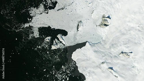 Melting glaciers time lapse, frozen Baffin Bay aerial satellite view from space. Animation based on image by Nasa photo