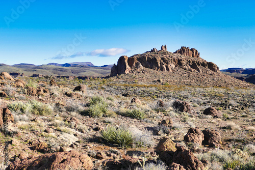Heavily eroded rock formation along the Monolith Garden Trail in the Mojave Desert near Kingman, Arizona, USA
 photo