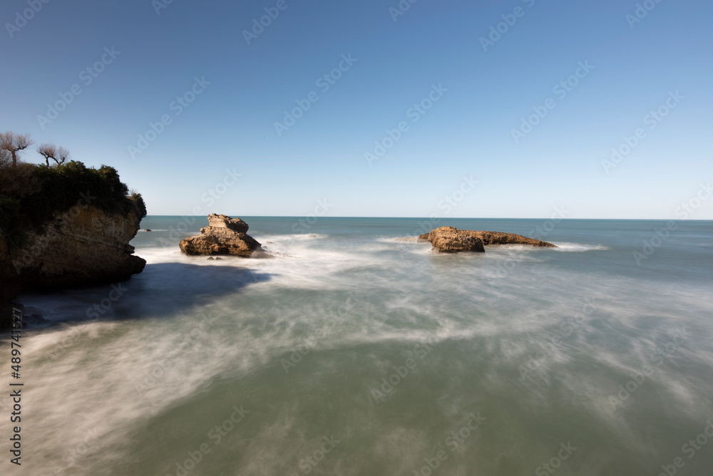 landscape of rocks in the sea long exposure