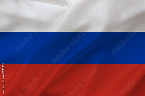 Russian flag on waving silk background. Russia national flag.