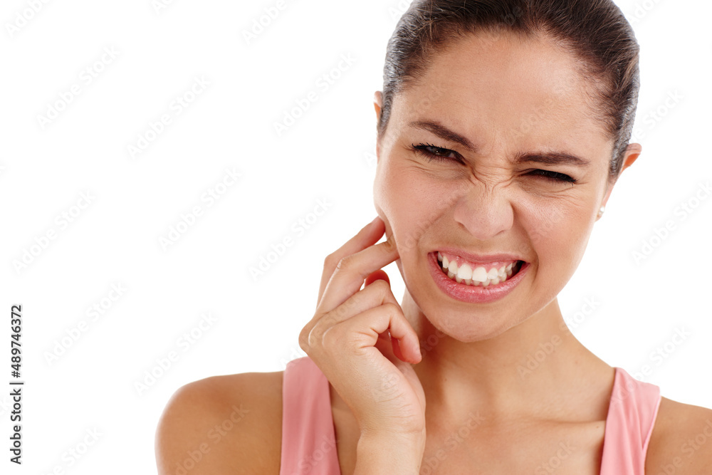 Time to see the dentist. Cropped shot of a beautiful young woman in physical pain standing in a studio-isolated on white. Time to see the dentist. Cropped shot of a beautiful young woman in physical pain standing in a studio-isolated on white.