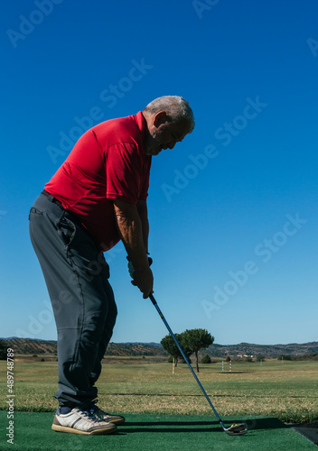 Senior golfer on a golf course