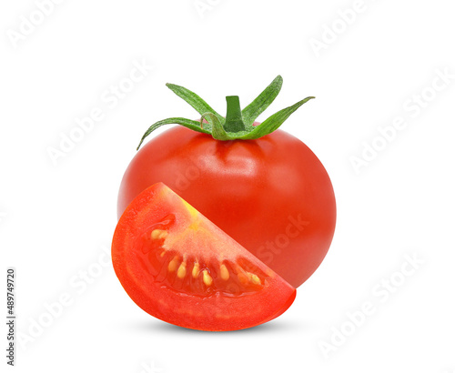 Whole, sliced tomato isolated on white background.