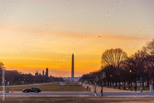 Washington DC city view at a orange sunset, including Washington Monument from Capitol building