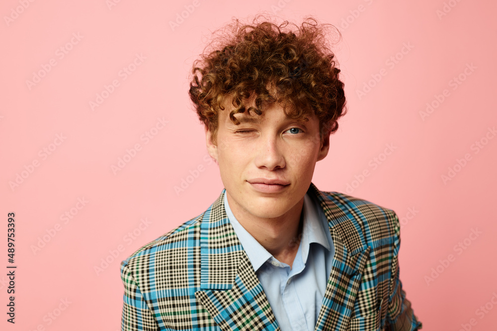 guy with red curly hair in a suit business look posing emotions Lifestyle unaltered guy with red curly hair in a suit business look posing emotions Lifestyle unaltered