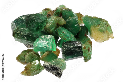 group of natural emerald crystals isolated on white background