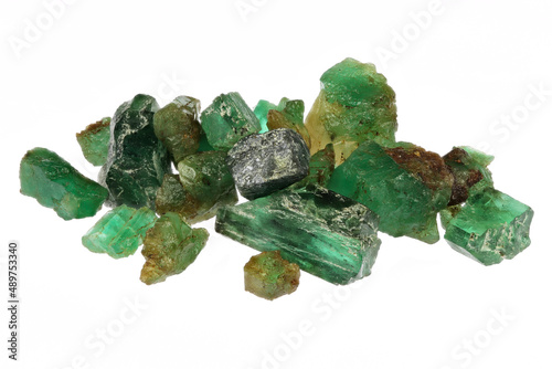 group of natural emerald crystals isolated on white background