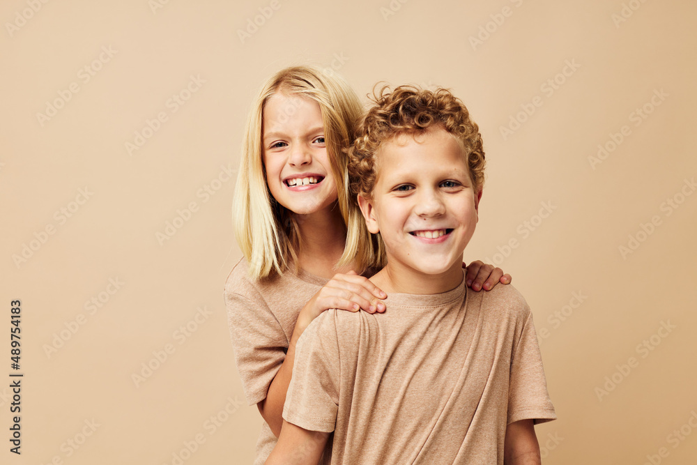 Cute stylish children gesticulate with their hands together Lifestyle unaltered Cute stylish children gesticulate with their hands together Lifestyle unaltered