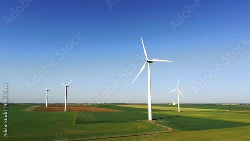 Wallpaper Mural Wind farm composed of many wind turbines in an area of ​​fields in France - aerial drone view with upward movement - green and renewable energy Torontodigital.ca