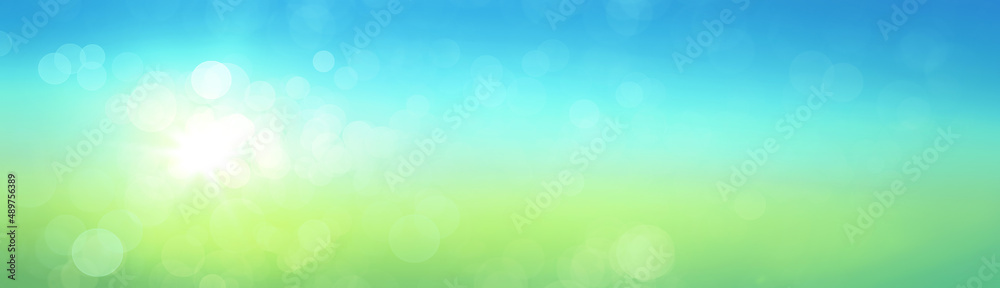 Fresh spring or summer abstract background. Blue and green horizontal colour gradients with round bokeh effect. Fresh spring or summer abstract background. Blue and green horizontal colour gradients with round bokeh effect.