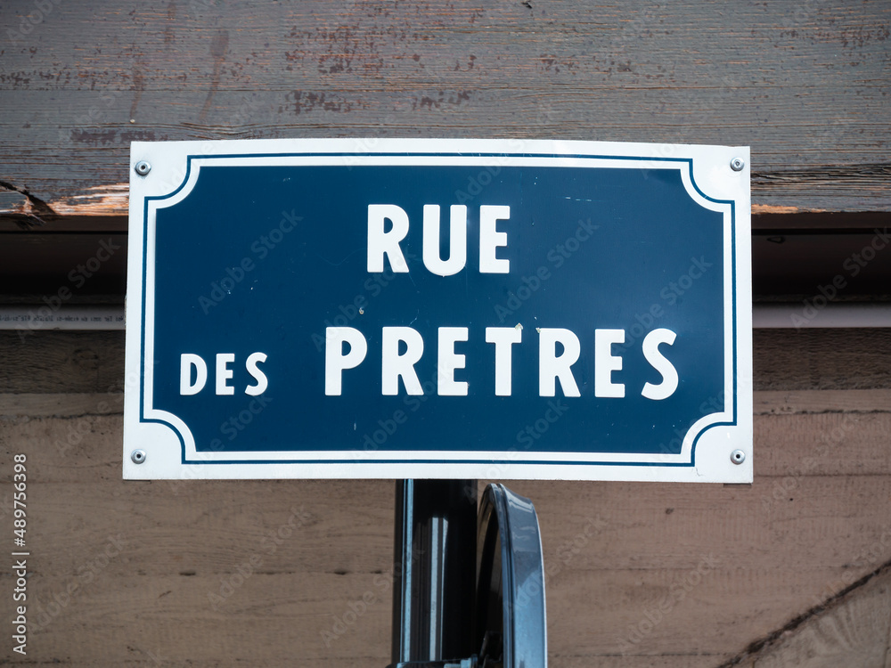 Obraz premium Blue sign for Rue des Pretres - Street of Priests in Colmar, France