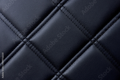 black capitone texture with rhombus or chequered pattern photo