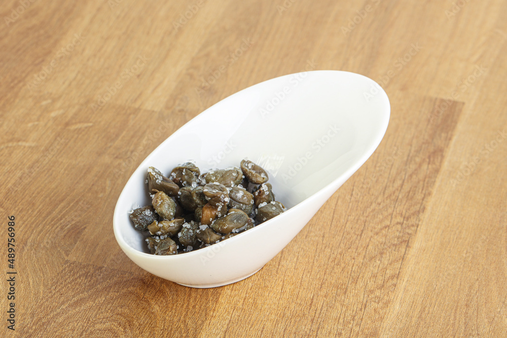 Salted marinated capers snack appetiser Salted marinated capers snack appetiser