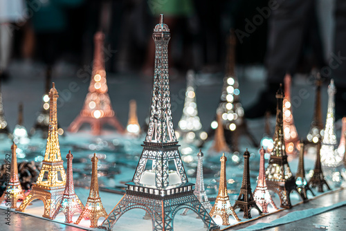 Illuminated models of the Eiffel Tower in Paris