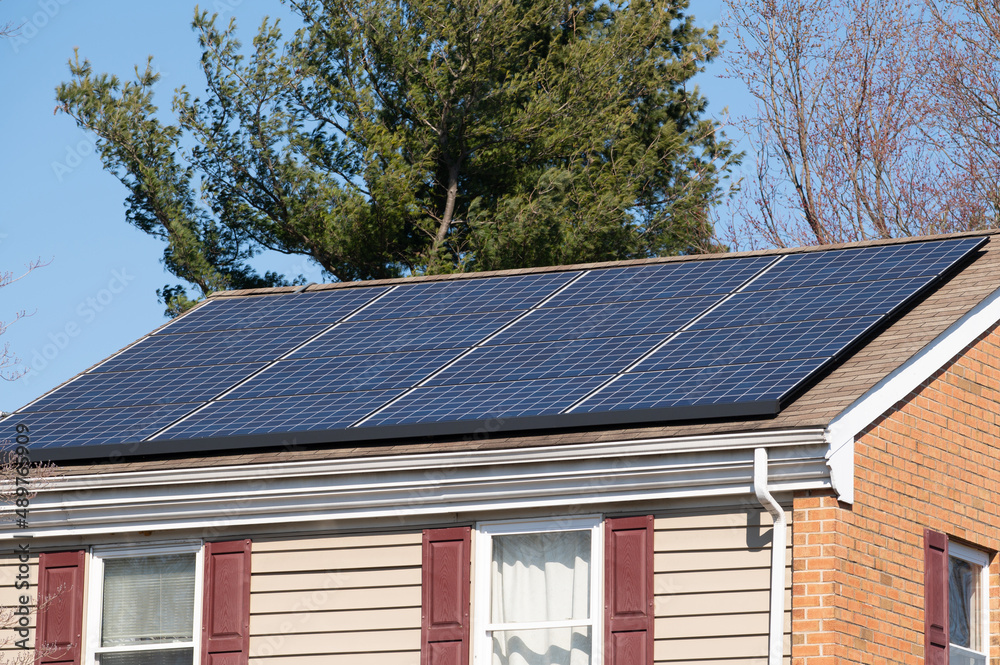 Fototapeta premium Solar panels on a roof of a house