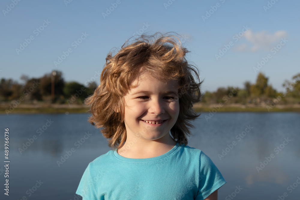 Close up portrait of a cute little child outdoor. Childhood and parenting concept. Close up portrait of a cute little child outdoor. Childhood and parenting concept.