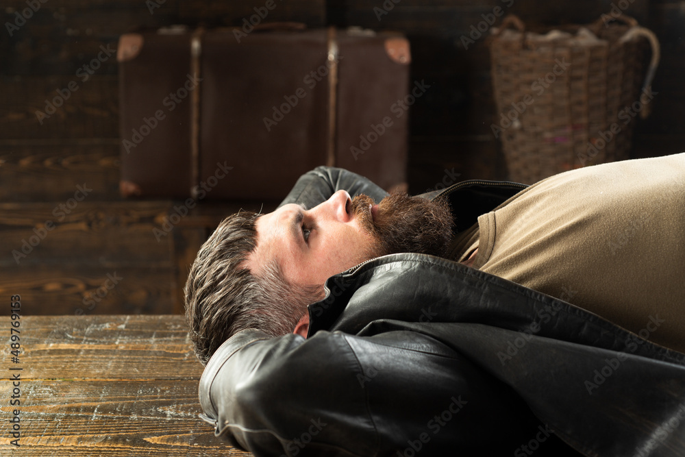 Brutal man, serious face of handsome male model, concept of men power and strong. Bearded guy relaxing, dreaming. Brutal man, serious face of handsome male model, concept of men power and strong. Bearded guy relaxing, dreaming.