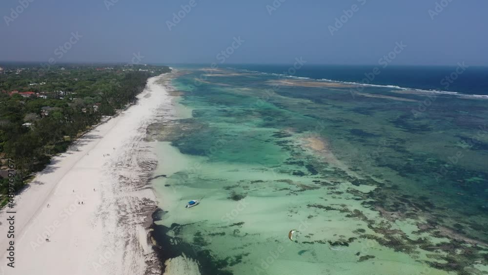 wind kite surfing boats jachts on water sea Drone view Coastline Diani beach landscape Kenyan African Sea aerial 4k waves indan ocean tropical mombasa turquoise white sand East Africa palms paradise wind kite surfing boats jachts on water sea Drone view Coastline Diani beach landscape Kenyan African Sea aerial 4k waves indan ocean tropical mombasa turquoise white sand East Africa palms paradise