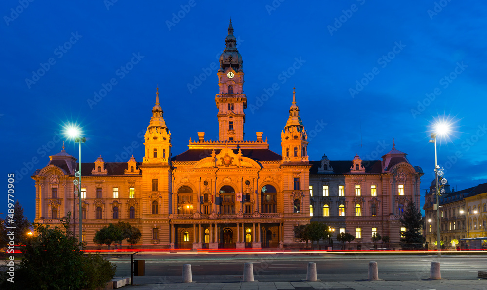 Fototapeta premium Illuminated building of Gyor City Hall in twilight, Hungary