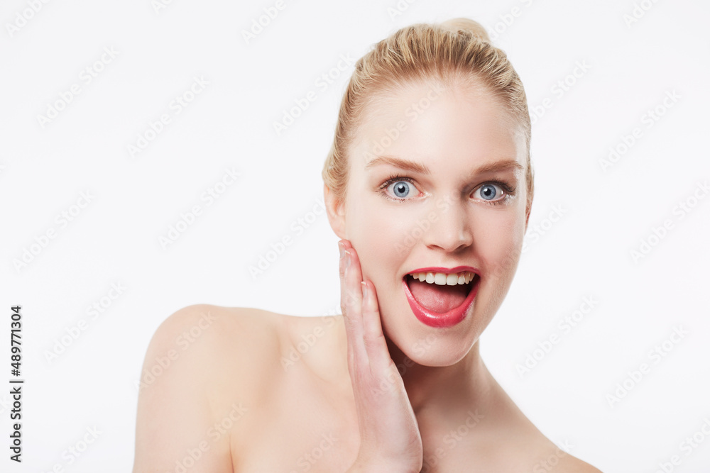 I love this shade of lipstick. Portrait of a happy model against a white background. I love this shade of lipstick. Portrait of a happy model against a white background.